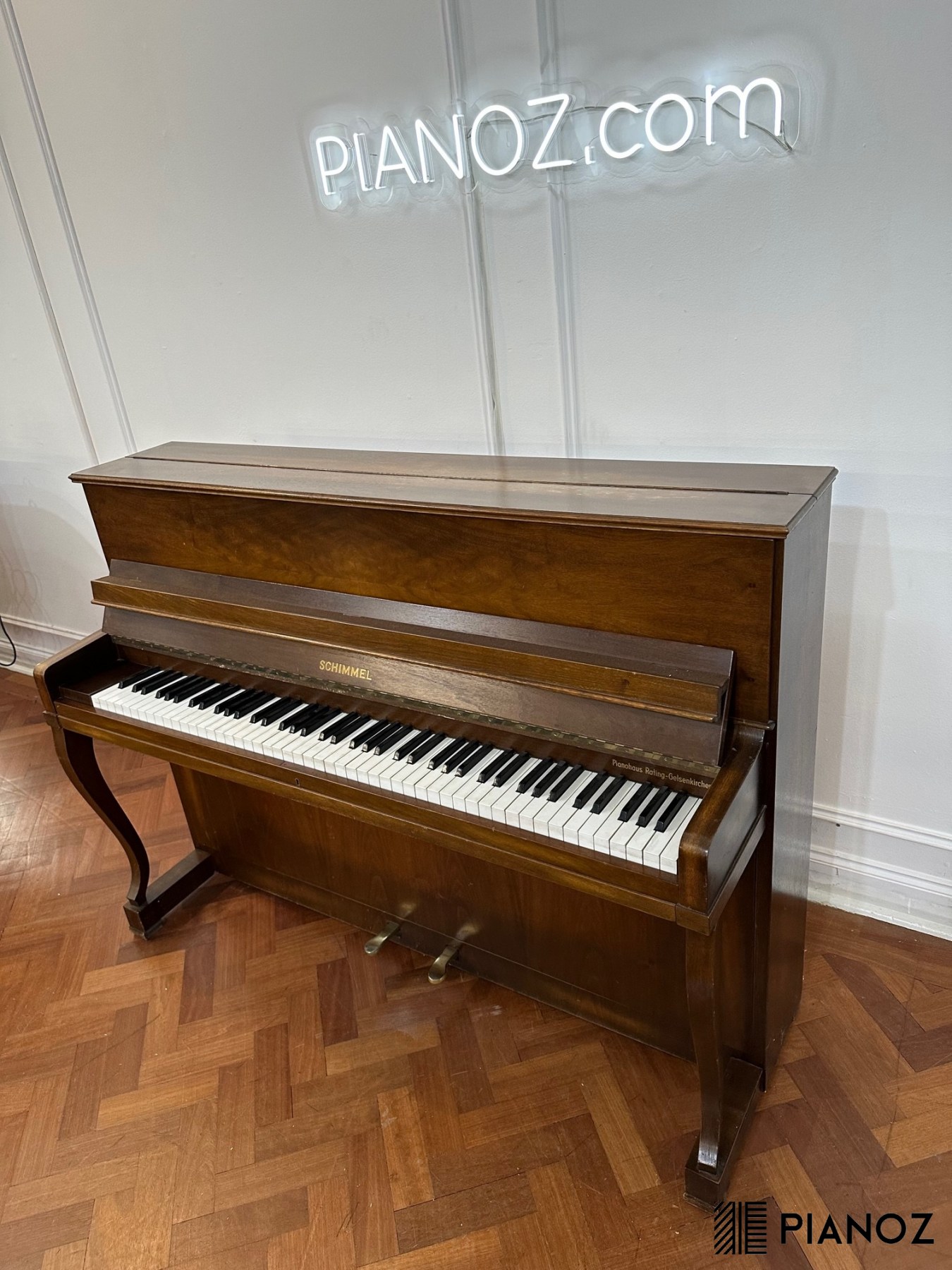 Schimmel deals upright piano